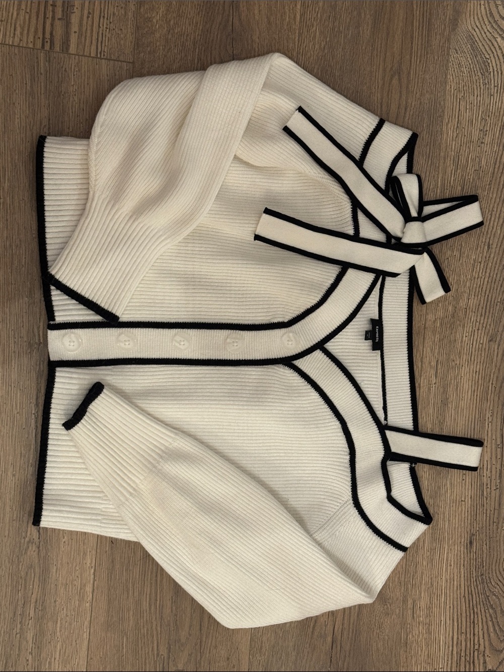 Express Cream Cropped Cardigan with Black Trim and Bow Tie